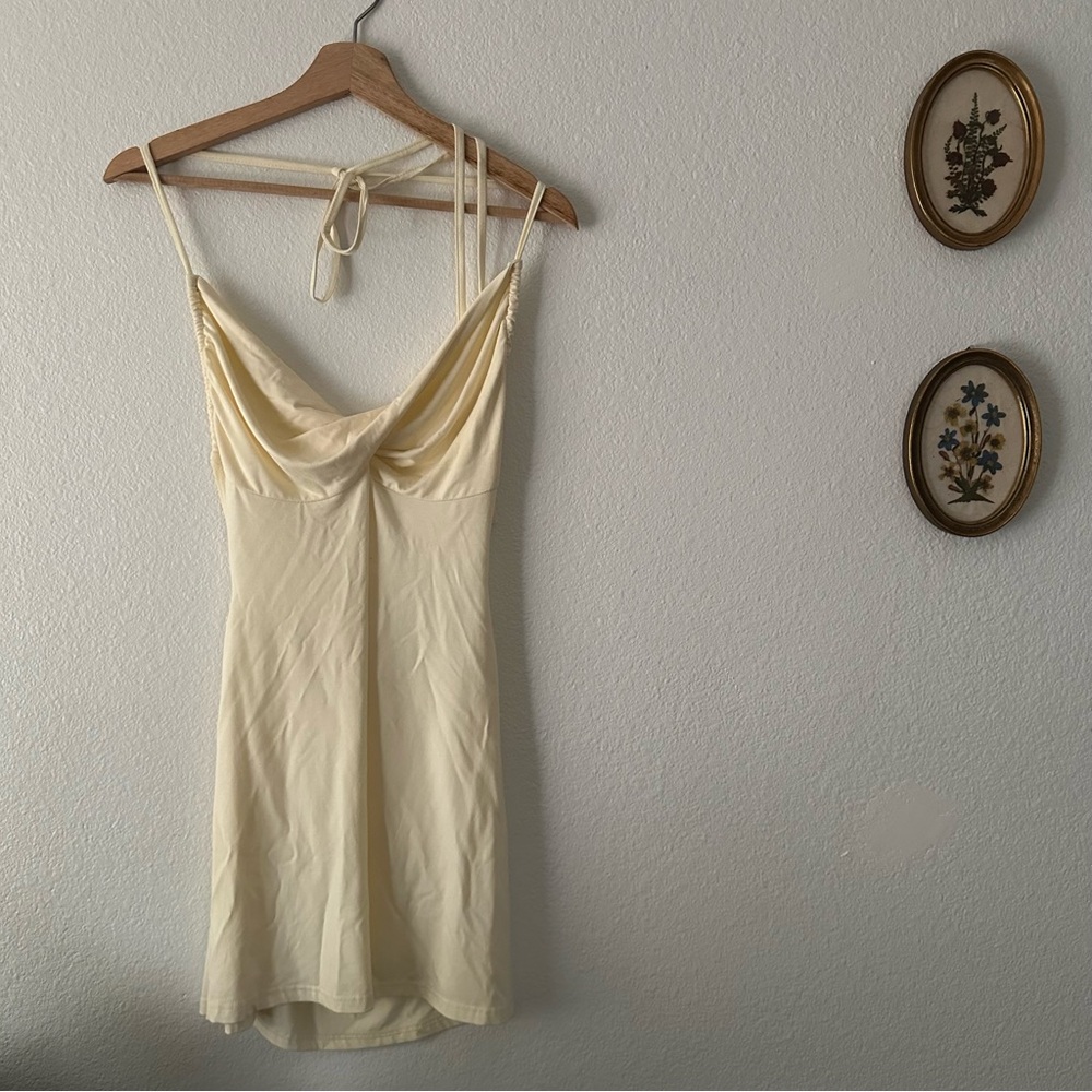 Yellow open back strappy mini dress